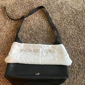 Michael Kors black leather purse.